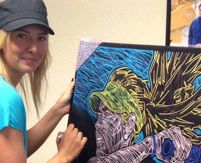 Tennis Legend Maria Sharapova signs a canvas giclee of the mural in Indian Wells, CA