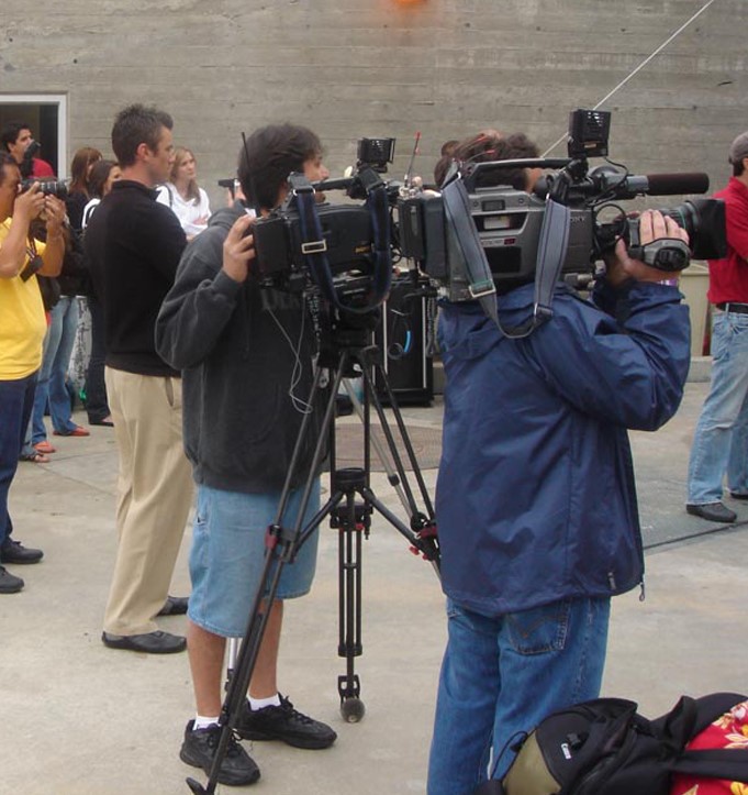 The media sets up at the start of the USC Traveler Mural Dedication Ceremony