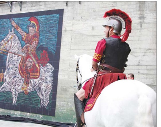 The Daily Trojan cover story of the USC Traveler Mural unveiling at the Coliseum