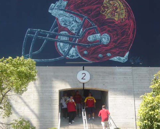 The USC Helmet Art Banner above the stairwell in Los Angeles, CA at the LAMC