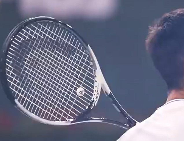 Tennis Legend Novak Djokovic hitting a shot at the BNP Paribas Open in Indian Wells, CA