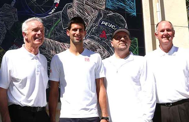 Raymond Moore, Novak Djokovic and Mike S. stand for the media and crowd