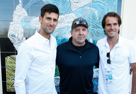 Novak Djokovic, Mike S. and Tournament Director Tommy Haas stand at the mural