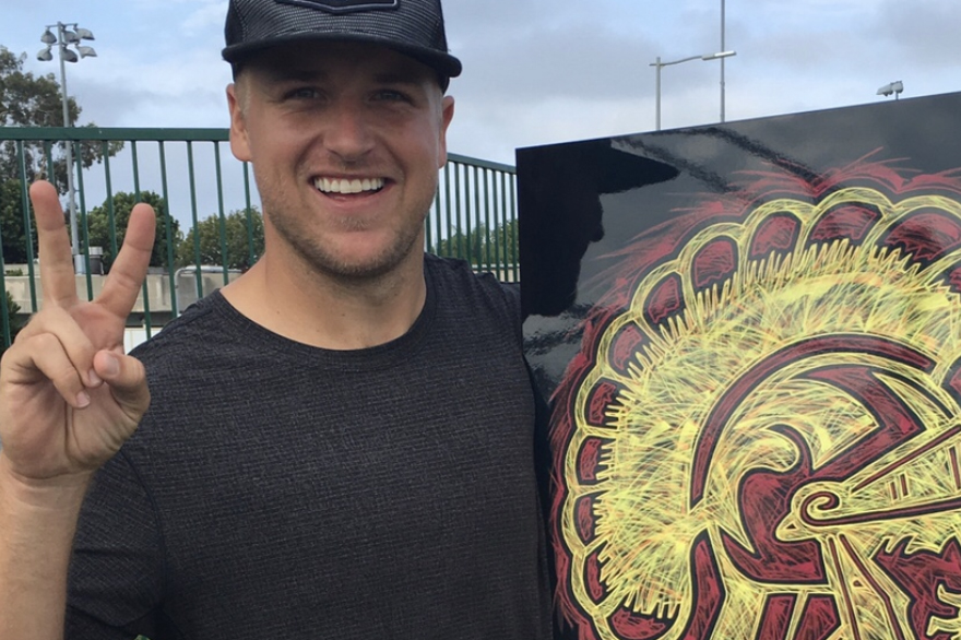 USC and NFL QB Matt Barkley in California with his personalized USC artwork